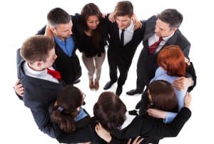 Business people standing in circle. Isolated on white